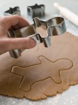 Cutting out a Gingerbread Man dough man