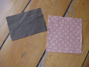 The brown fabric will form the outside of the pocket; the pink fabric becomes the lining and contrast strip