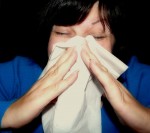 Sinusitis Sneezing in a White Hankie