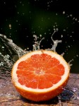 Grapefruit splashed with water