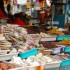 Save money and slash your family's food budget by shopping local. picture of open air market
