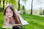 child-reading-book-outside child-reading-book-outside